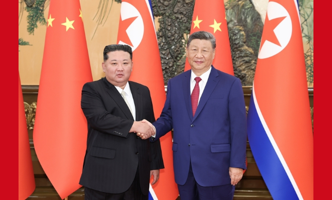 习近平同朝鲜劳动党总书记、国务委员长金正恩举行会谈