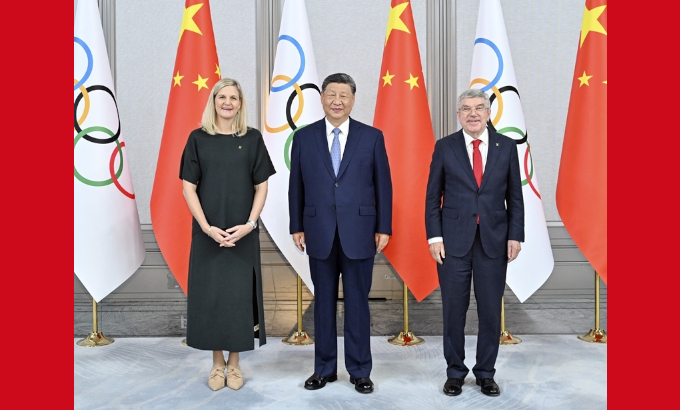 习近平会见国际奥委会主席考文垂和终身名誉主席巴赫